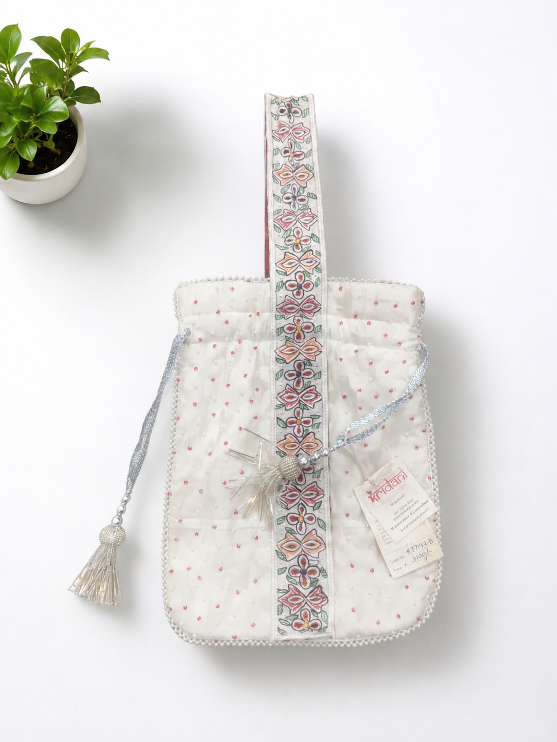 Handcrafted Floral Cutwork Potli on Ivory Cream Base