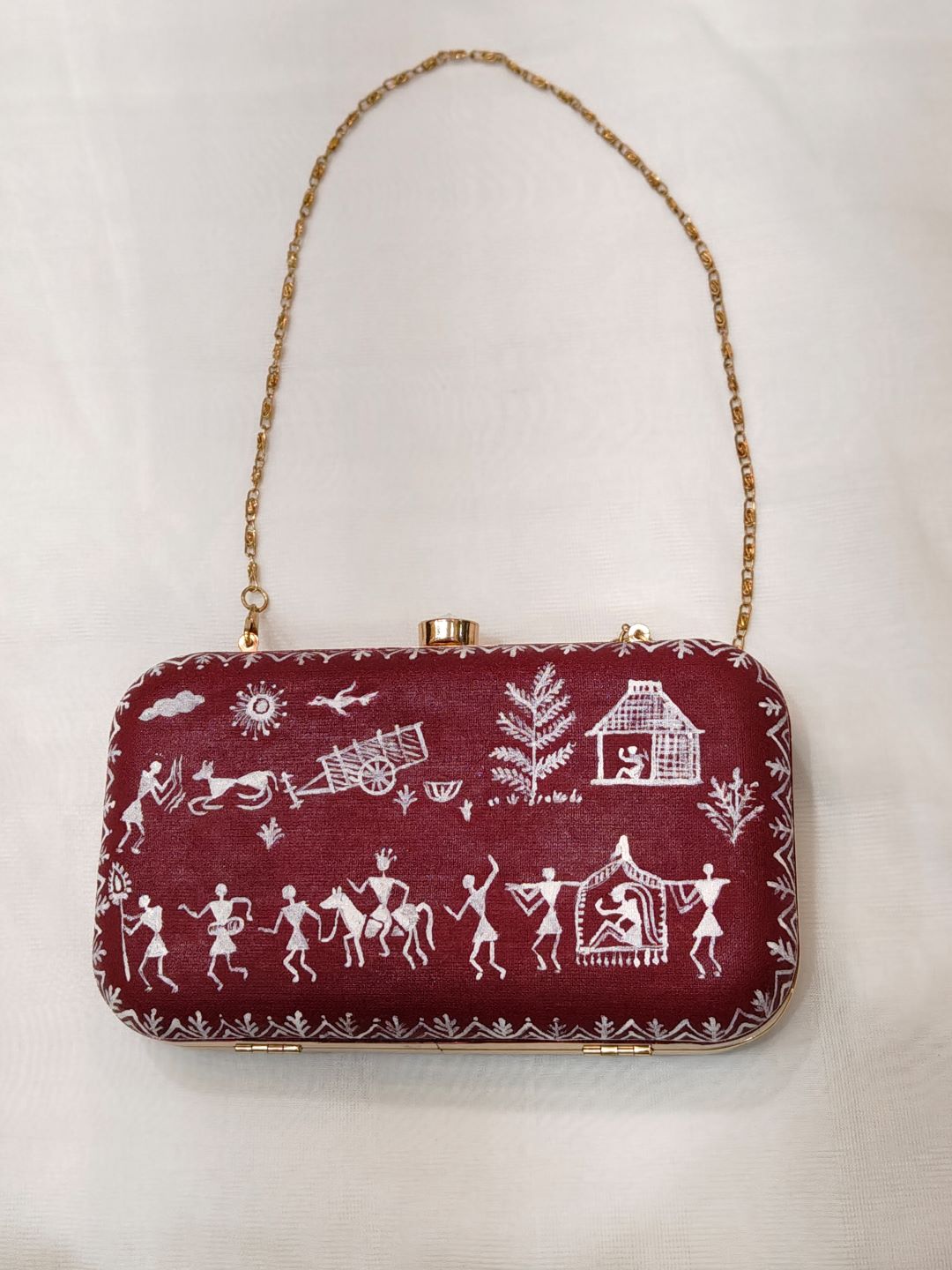 Handpainted Worli Art Clutch on Canvas with Metal Clip – Maroon Base