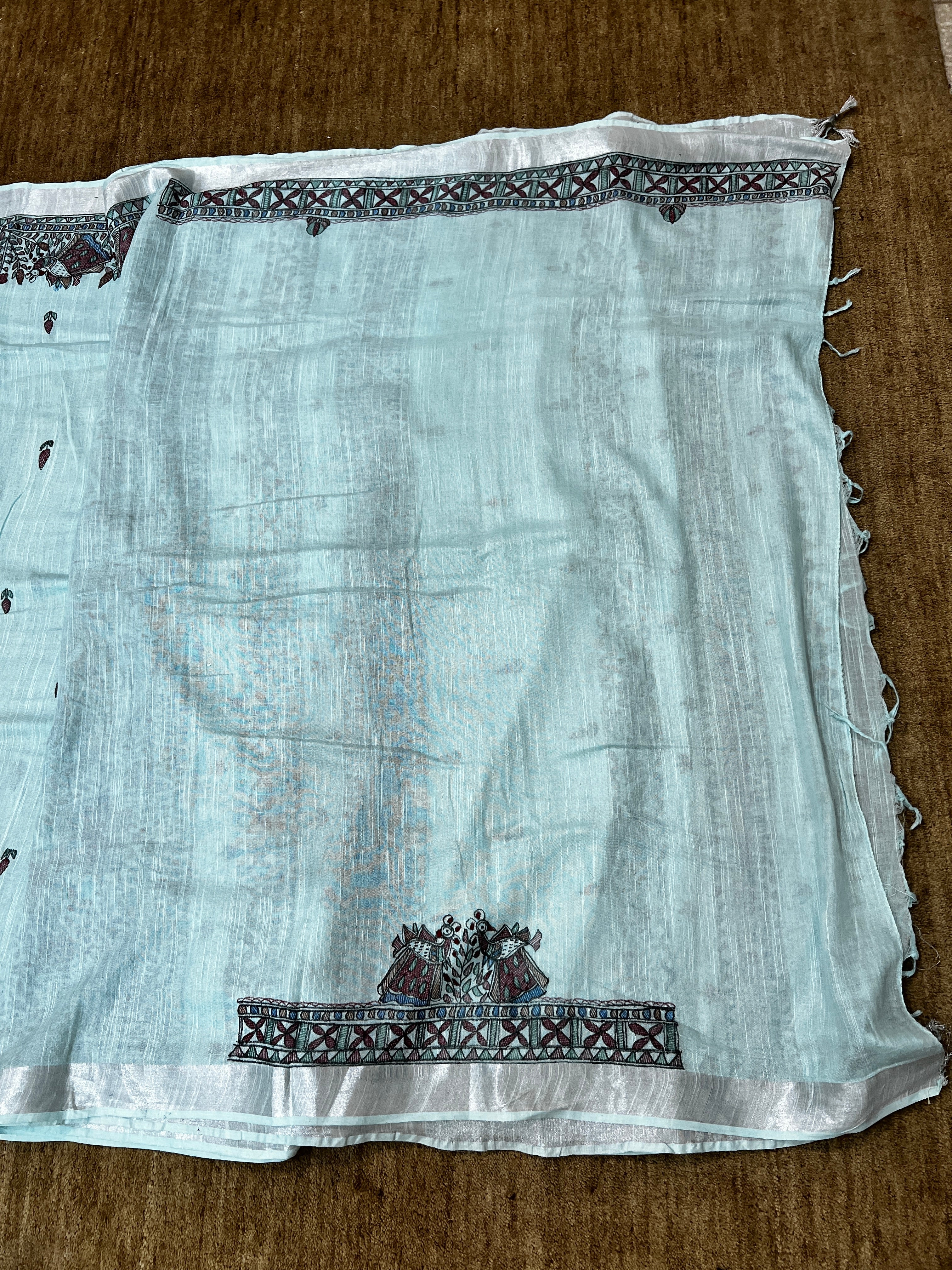 Hand-painted Rasleela Madhubani Linen Cotton Saree with Buti Body and Geometric Zari Border in Ice Blue