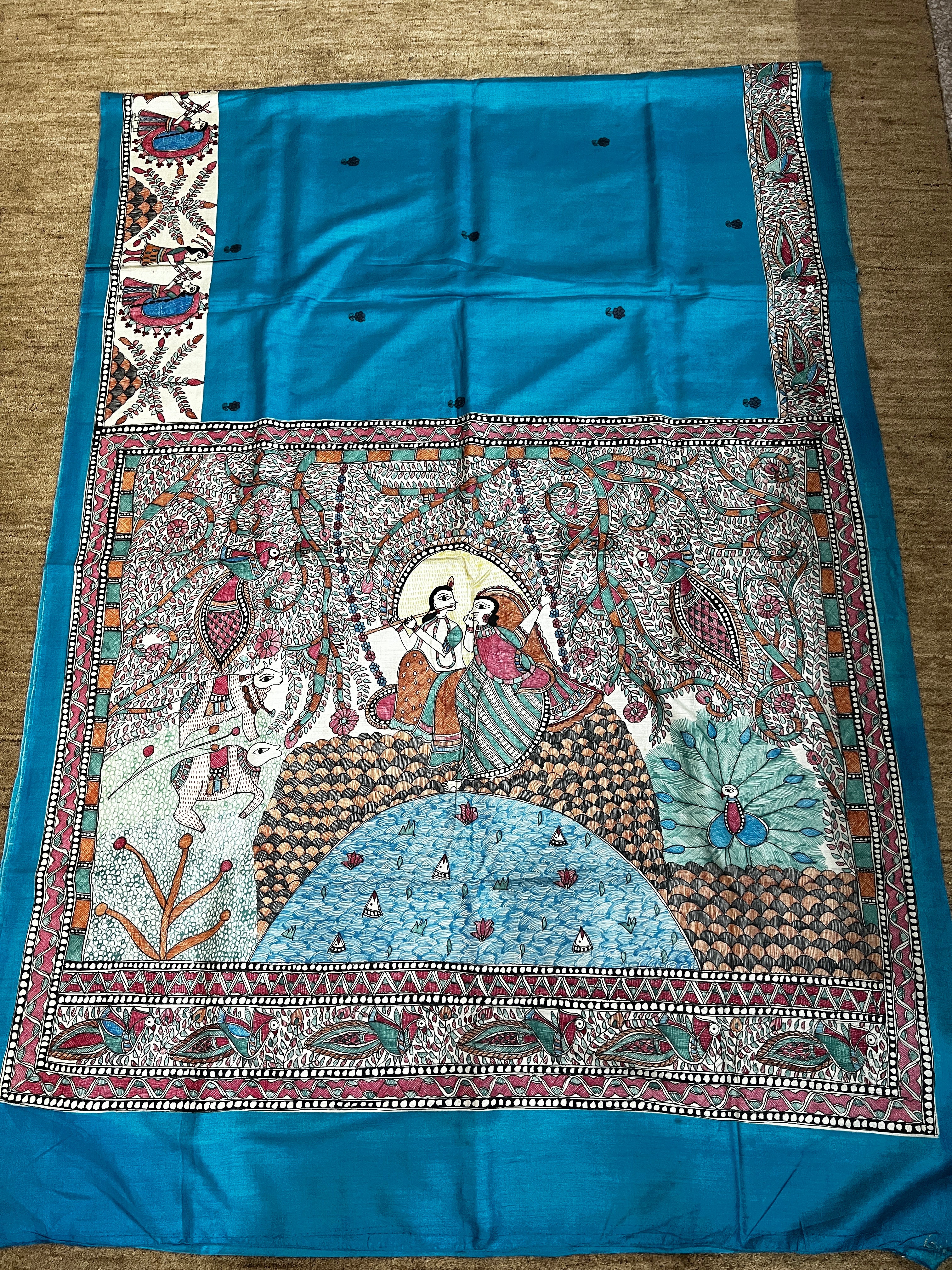 Premium Bright Blue Tussar Munga Silk Hand-Painted Madhubani Saree with Grand Radha Krishna Pallu