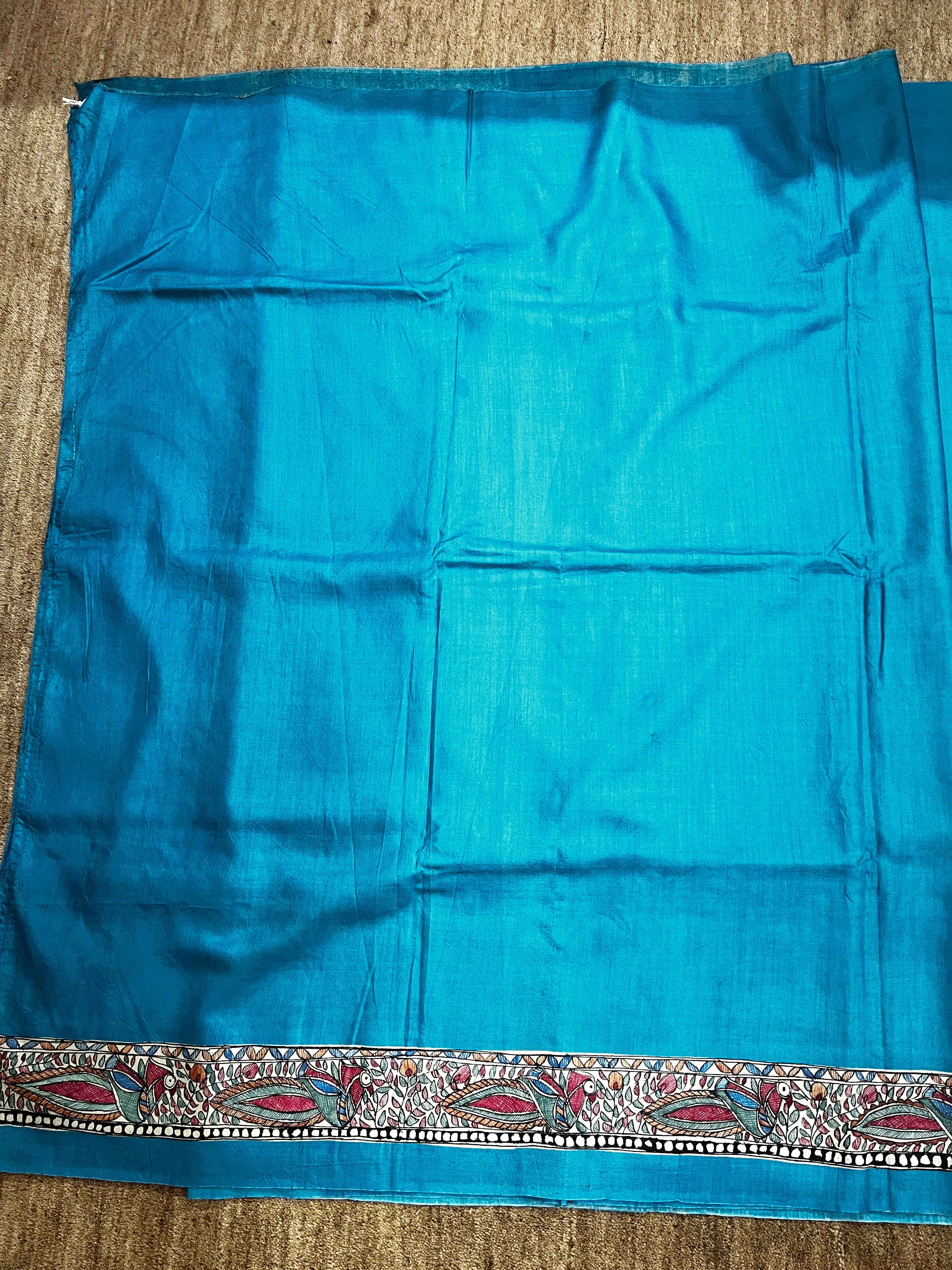 Premium Bright Blue Tussar Munga Silk Hand-Painted Madhubani Saree with Grand Radha Krishna Pallu