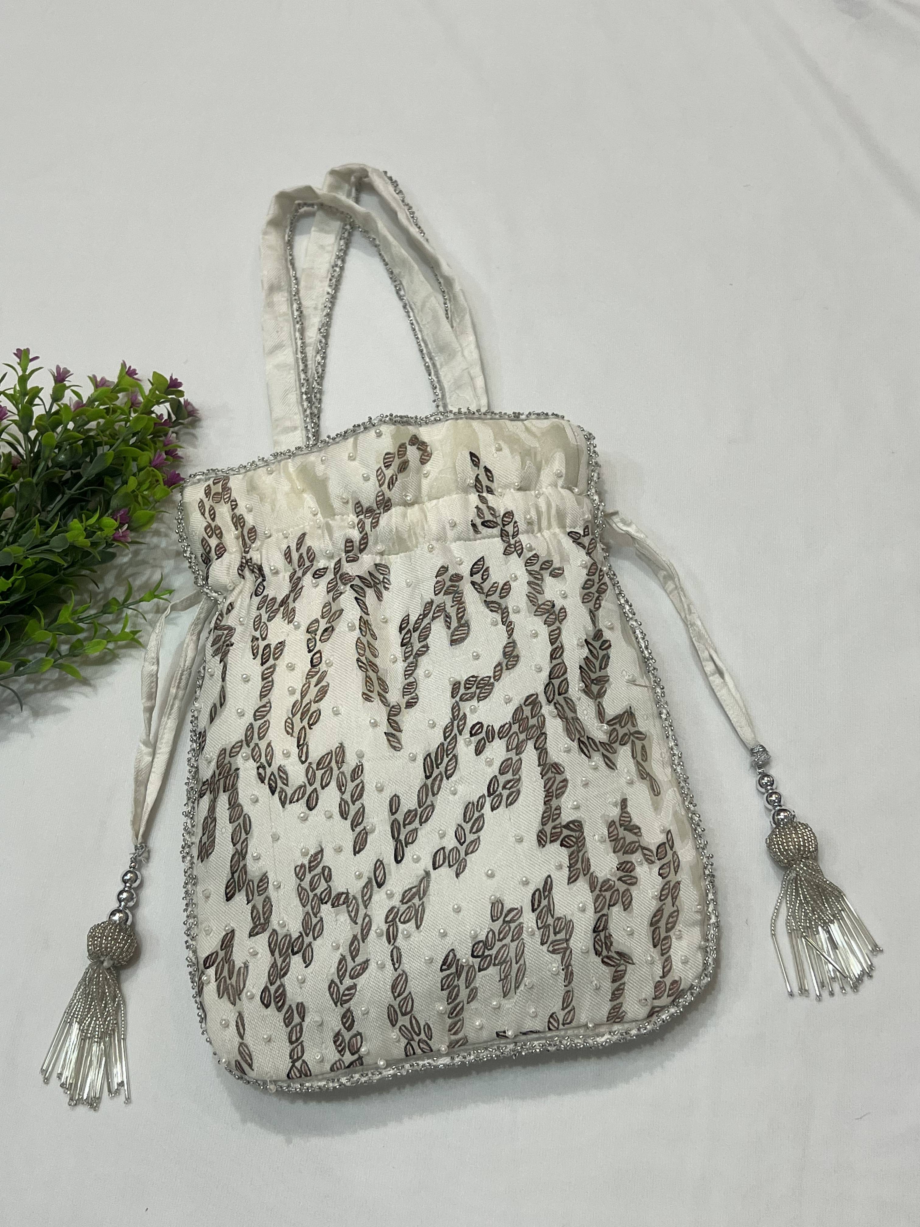 Hand-Painted White Potli with Maroon Leaves