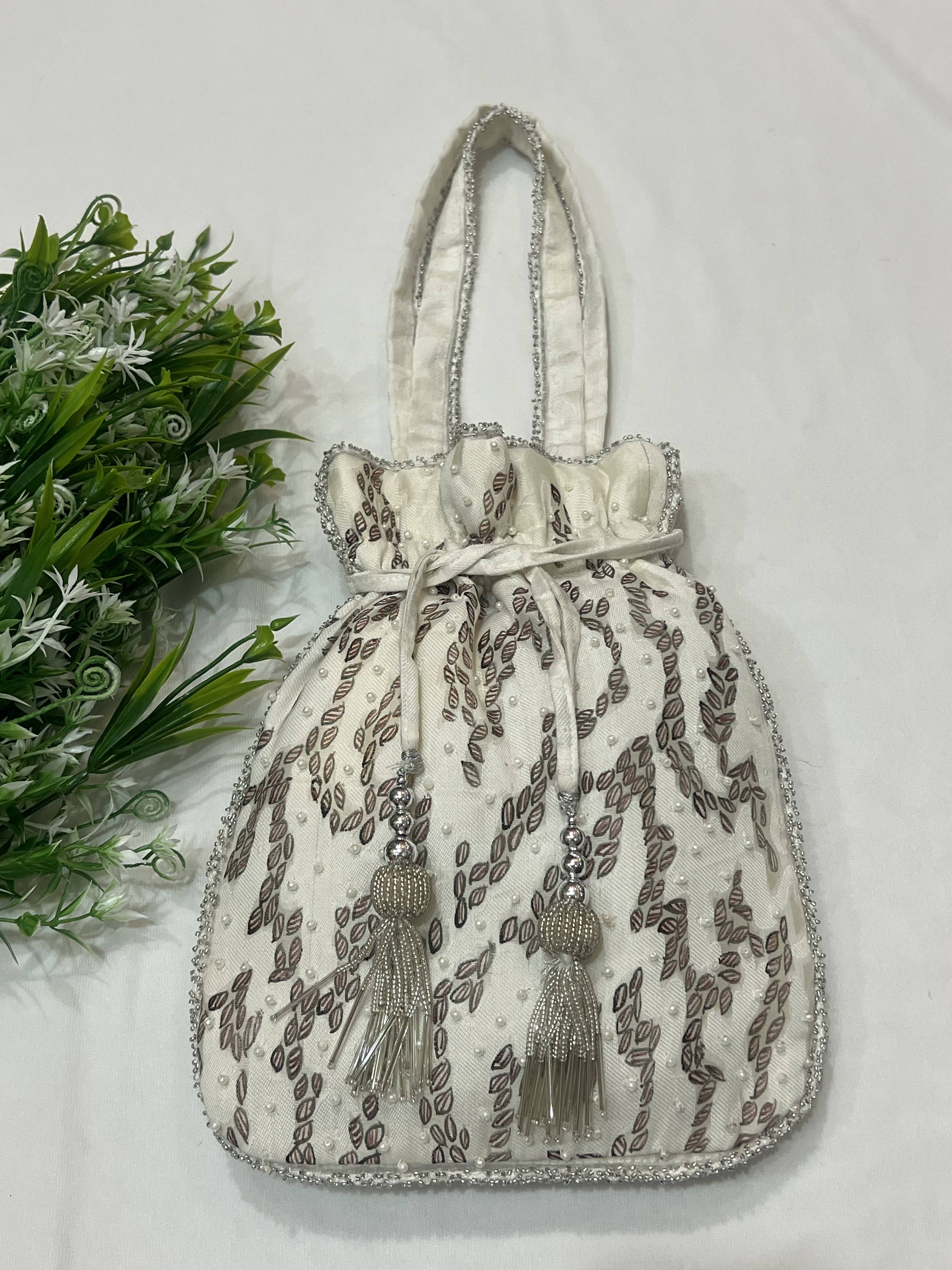 Hand-Painted White Potli with Maroon Leaves