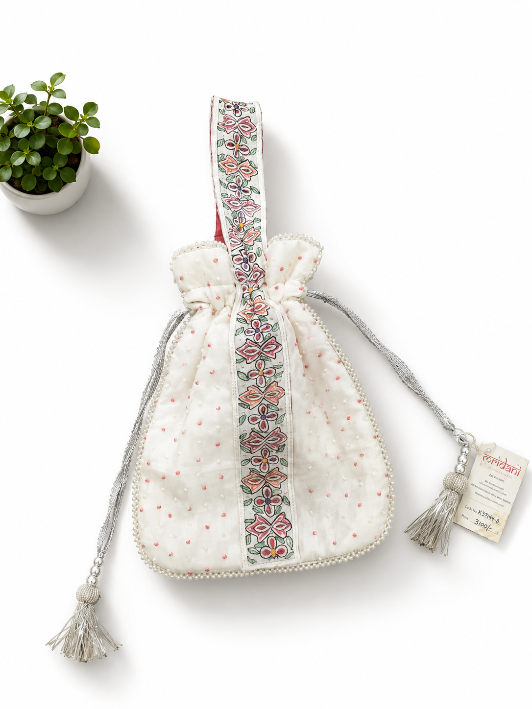Handcrafted Floral Cutwork Potli on Ivory Cream Base